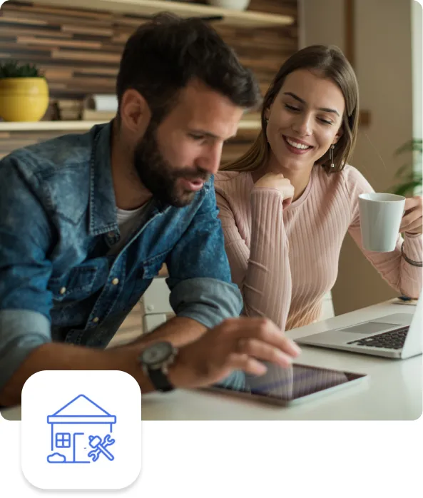 Dos personas con computadores y tablets